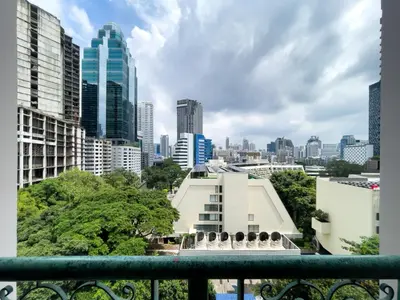 a view of a city skyline from a balcony at 300m BTS l Large 110 sqm l Pool and Sauna in Bangkok