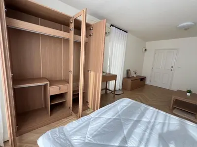 a bedroom with a bunk bed and a desk at Minimal Condo At Ramkhamhaeng 64 in Sathani Ban Hua Mak