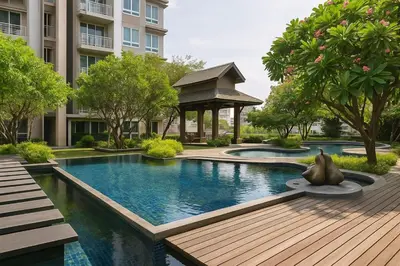 a swimming pool in a building with a gazebo at Cozy High-Rise Escape in the heart of Bangkok! in Bangkok