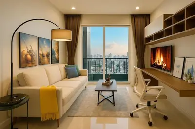 a living room with a couch and a chair and a fireplace at Cozy High-Rise Escape in the heart of Bangkok! in Bangkok