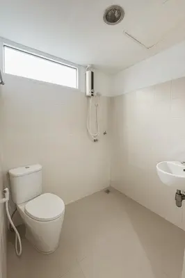a bathroom with a toilet and a sink at City View Condo 5 mins to MRT Sutthisarn in Bangkok
