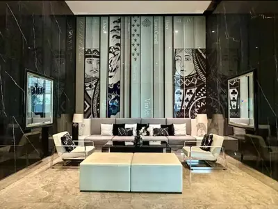 a living room with a couch and a table and chairs at Thonglor Next to BTS Modern Condo - Fitness gym with full view in Bangkok