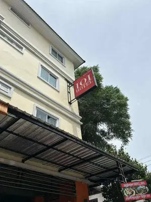 a sign on the side of a building at 101Hotel in Bangkok
