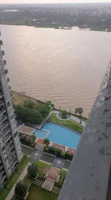 an aerial view of a large body of water at Manor Riverfront Stay, Chaophraya View Condo, Nonthaburi in Ban Tha It (1)