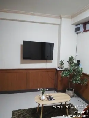 a living room with a flat screen tv on a wall at Old Town cozy corner in Thonhuri