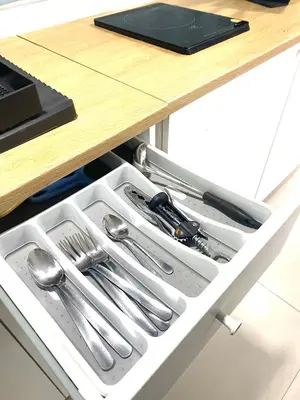a drawer in a kitchen with utensils in it at AkkHouse in Ban Bang Toei (1)