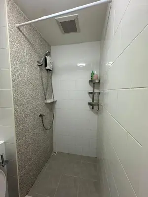 a bathroom with a shower with a toilet and a sink at ห้องพัก แบบ Studio ติดเซ็นทรัลเวสเกต in Ban Bang Krabu