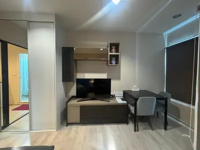 a room with a desk and a table with a computer at ห้องพัก แบบ Studio ติดเซ็นทรัลเวสเกต in Ban Bang Krabu