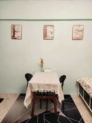 a dining room with a table and chairs at 704-STP Homely room Free Wi-Fi and Near BTS in Bangkok