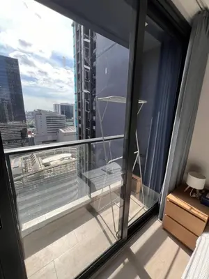 a balcony with a view of a city at Free Parking with Balcony Pool and Gym MRT 200m in Ban Na Song