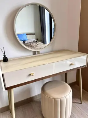a dressing table with a mirror and a stool at 40th Fl Skyview with Standing Desk Pool and Gym in Ban Na Song