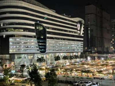 a large building with a traffic light in front of it at King Bed with Living Room Pool and Gym MRT 200m in Ban Na Song