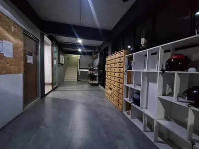 a room with a hallway with shelves and a room with a room at Irich Theparak S207- Bts-Chang Erawan 2kms in Ban Khlong Hua Sakae