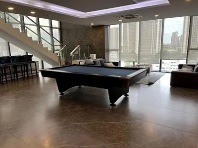 a billiard room with a pool table in a building at Free Parking with Balcony Pool and Gym MRT 200m in Ban Na Song