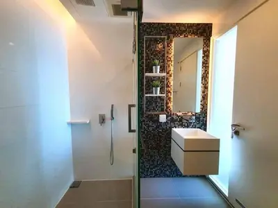 a bathroom with a sink and a mirror at The room, luxury condo 21fl 1 Bedroom ,near bts in Bangkok