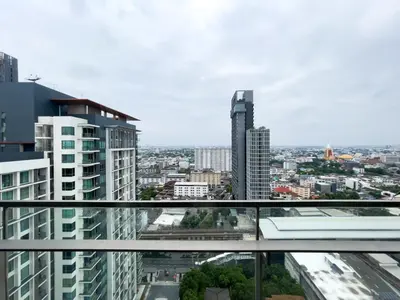a view of the city from the balcony of a building at Near BTS l Central Sukhumvit l Pool and Garden l Sontana in Bangkok