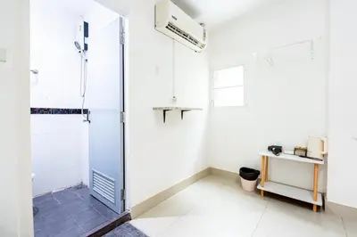 a bathroom with a shower and a glass door at XX Oh My Nap - Sukhumvit 3 - โอ้มายแนป สุขุมวิท 3 in Makkasan