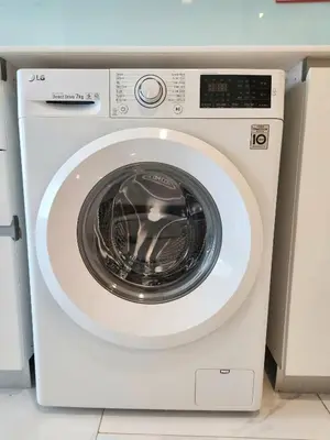 a white washing machine sitting in a kitchen at Prime 1BR in Sukhumvit 11 CentralStylishModern in Makkasan