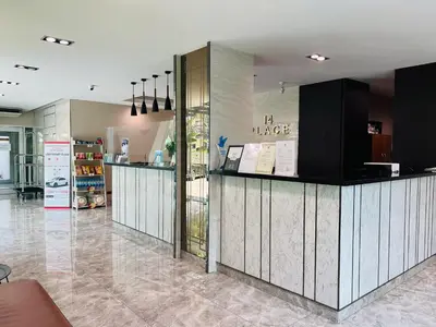 a restaurant with a counter in a room at 14 Place in Bangkok