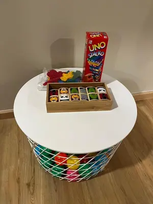 a white table with a shelf with a box on it at BubbleHumbleBangkok in Bangkok