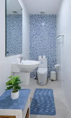a bathroom with a sink and a toilet and a shower at Modern 3BR Rama Mansion Near Airport plus Amenities in Sathani Ban Hua Mak