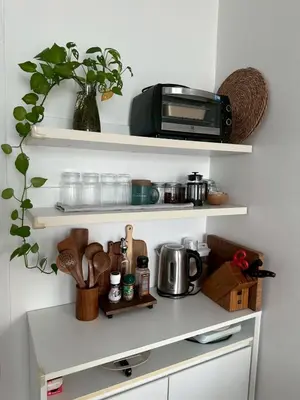 a kitchen shelf with a toaster oven on it at Free Wi-Fi Private Room I Near the Mall Bangkapi in Bangkok