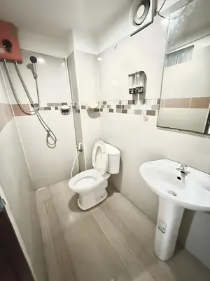 a bathroom with a toilet and a sink at xxzNAP - Khaosan Road สแนป ตรอกข้าวสาร in Bang Bua Thong Railway Station