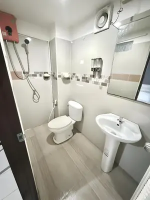 a bathroom with a toilet and a sink at xxzNAP - Khaosan Road สแนป ตรอกข้าวสาร in Bang Bua Thong Railway Station