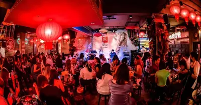 a crowd of people sitting at tables in a restaurant at SleepPop Sukhumvit 42 - BTS Ekkamai in Phra Khanong