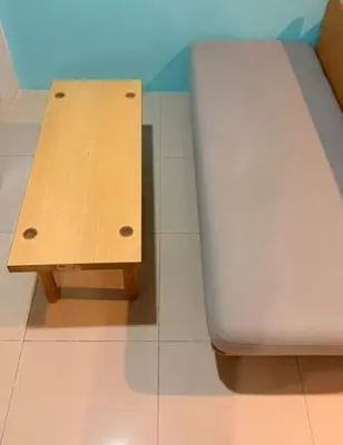 a bed and a bench in a room at อุดมสุข BTS udomsuk in Bangna