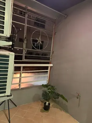 a plant in a room with an air conditioner at อุดมสุข BTS udomsuk in Bangna
