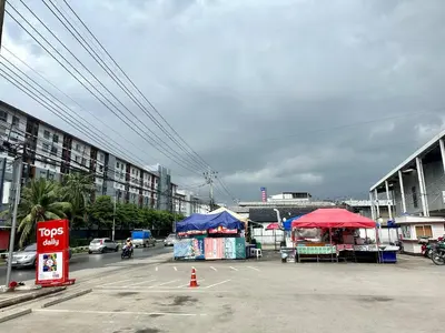 a parking lot with tents in a parking lot at Plum condo Bang-yai station in Nonthaburi