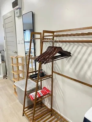a room with two bunk beds and a mirror at New Apt, Near Siam Paragon, 2 Min to BTS 1BR,4Pax in Bangkok