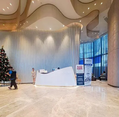 a lobby with a christmas tree in a building at Luxury duplex condominium Samyan area 28th fl near MRT in Bangkok