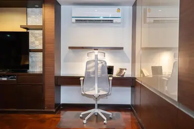 a desk with a chair in a room at office 2 in Bangkok