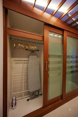 a glass cabinet with a fan and a window at office 2 in Bangkok