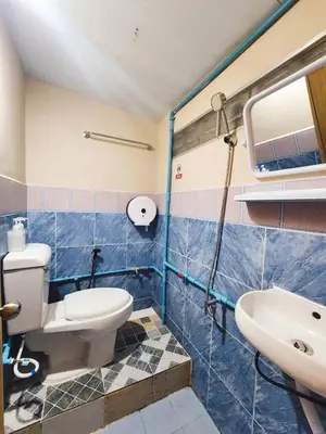 a bathroom with a toilet and a sink at 215-Olan Place Free Wi-Fi and Near BTS line in Sathani Bang Khen