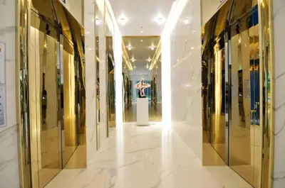 a hallway of a fashion store with a mannequin in the middle at Stylish Luxury 1 Bedroom, Hyde Sukhumvit 11, Near BTS Nana & Asok in Bangkok