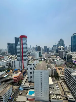 an aerial view of a city with tall buildings at Silom Hideaway 27 Floor City View, 4-min to BTS in Bangkok
