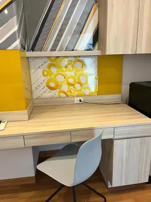 an office with a desk and a chair at Lumpini Park Vibhavadi-Chatuchak in Bangkok