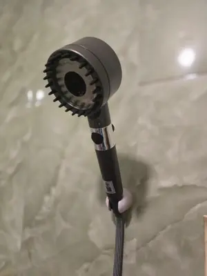 a blow dryer in a room with at 114 Boutique style apartment with Air Con and free Wi-fi in Bangkok