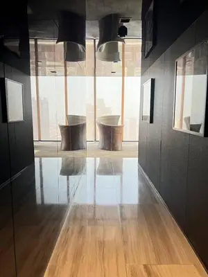 a room with two chairs and a large window at Ashton Mrt At Bts-Silom Near samyan mitrtown in Bangkok