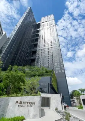 a tall building with a sign in front of it at Ashton Mrt At Bts-Silom Near samyan mitrtown in Bangkok