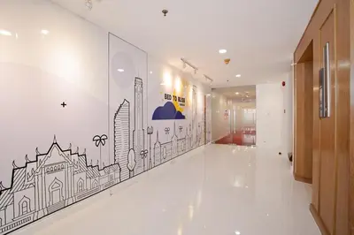 a hallway with a wall mural of a city at Modern Twin BR Bath & Bathtub Retreat BTS BTB6 in Bangkok