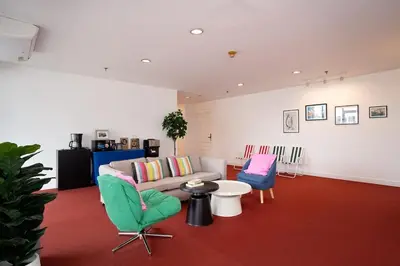 a living room with a couch and two chairs at Modern Twin BR Bath & Bathtub Retreat BTS BTB6 in Bangkok
