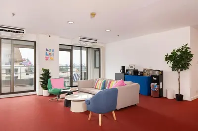 a living room with a couch and chairs at Stylish Twin BR w Ensuite Bath & Relaxing Tub BTB7 in Bangkok