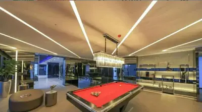 a large room with a pool table in it at origin phayathai 28 in Bangkok