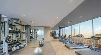 a gym with a view of the city at origin phayathai 28 in Bangkok