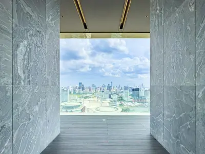 a room with a view of a city from a window at New City Condo in Central Bangkok Siam Paragon Central World in Pratunam