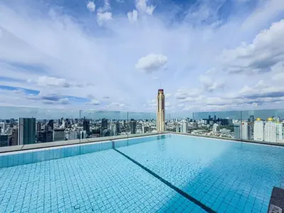 a swimming pool on the roof of a building at New City Condo in Central Bangkok Siam Paragon Central World in Pratunam